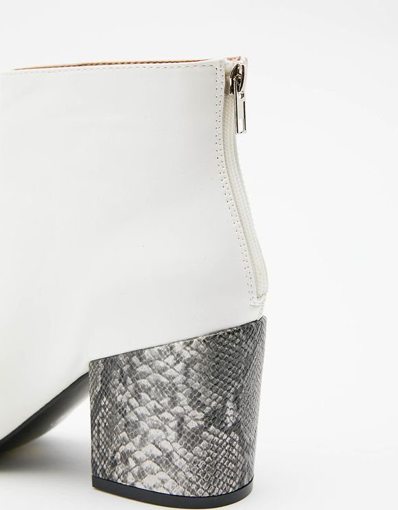 snake print heels and bag